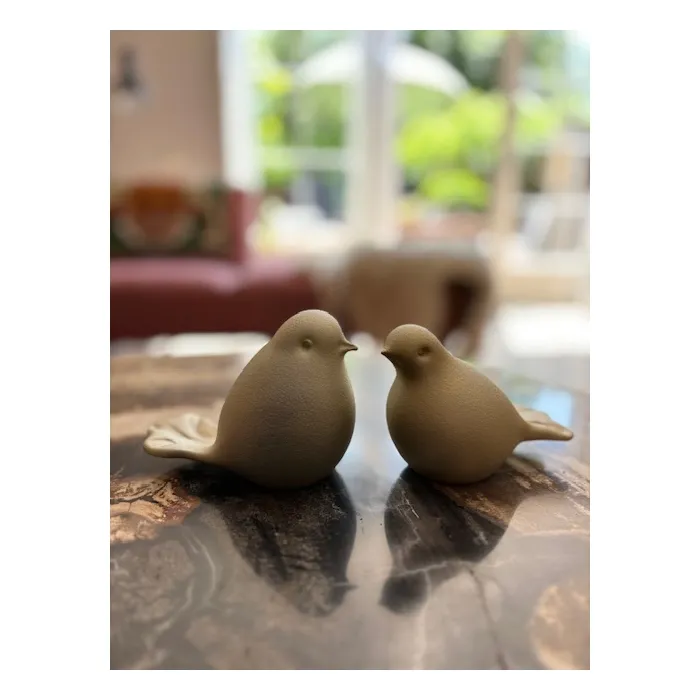 Urn vogel gold color