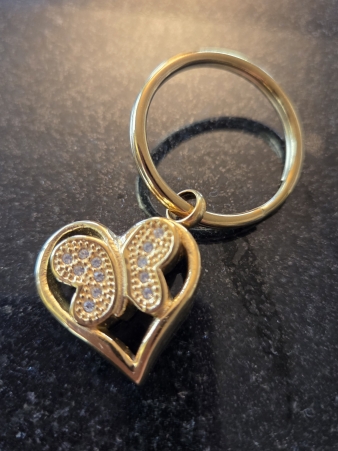 As sleutelhanger vlinder ( geelgoud kleur)