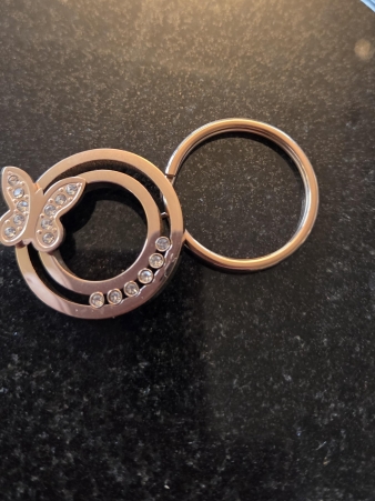 As sleutelhanger vlinder (rose kleur)